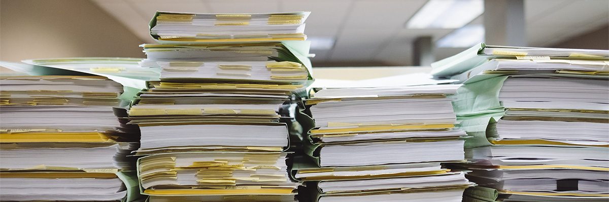 stacks of paper filed neatly